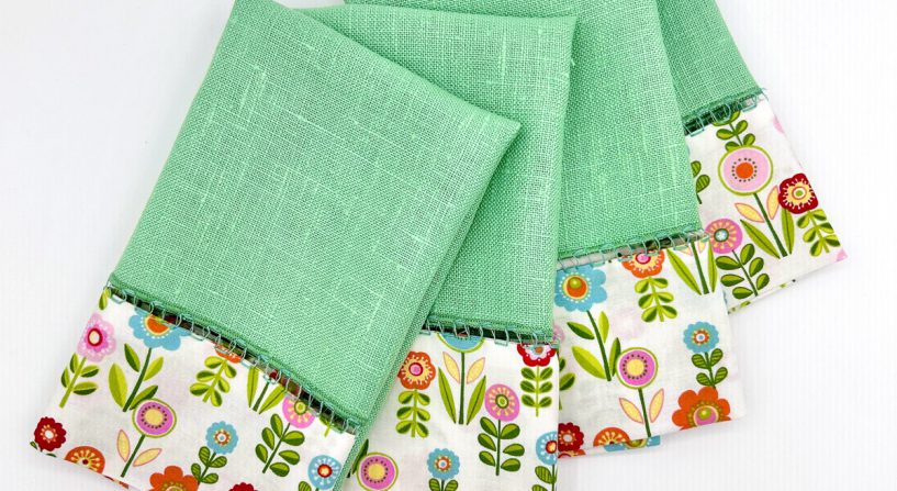 overhead photo of flowered and green fabric upcycled napkins