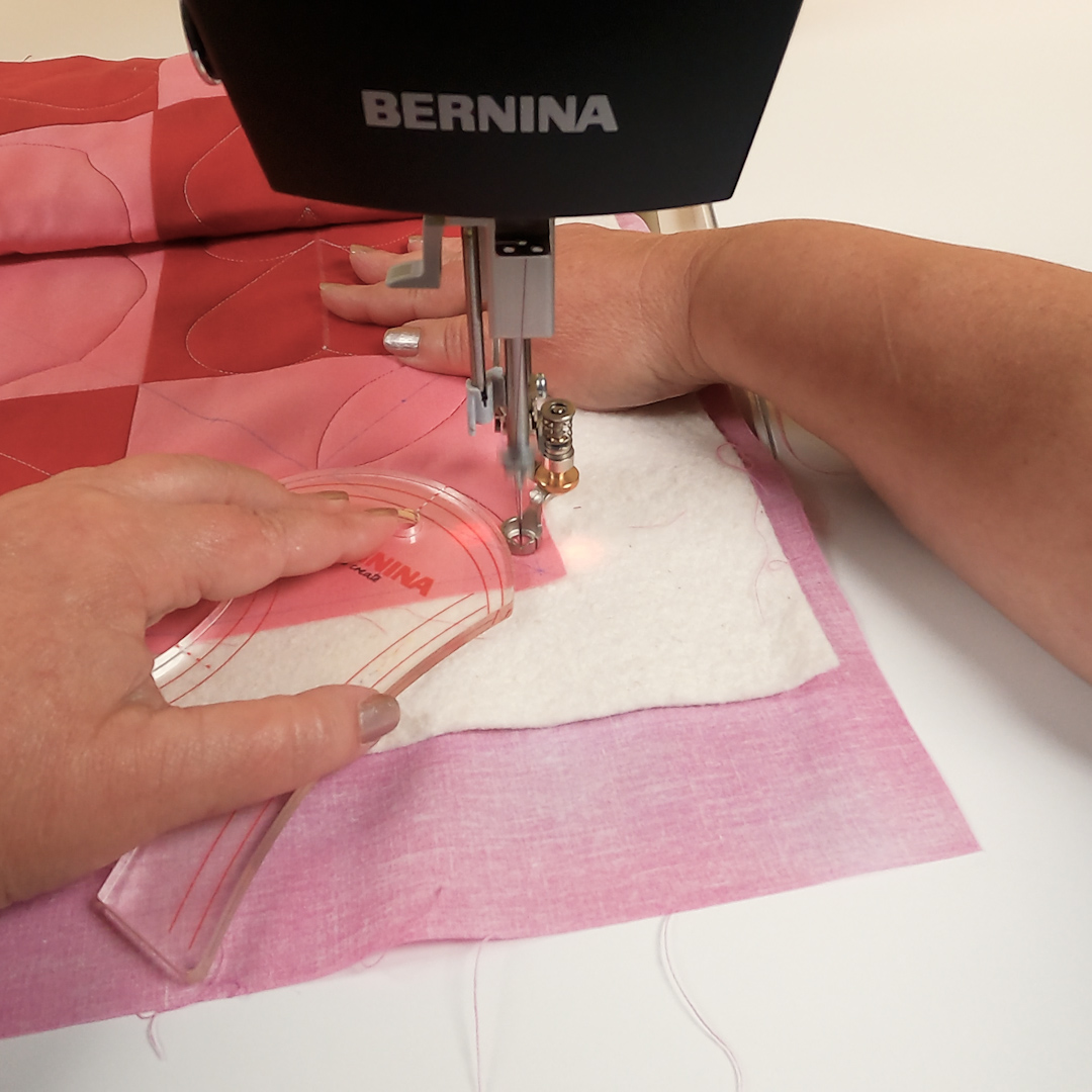 Close-up view of BERNINA multi-curve Ruler stitching corner 