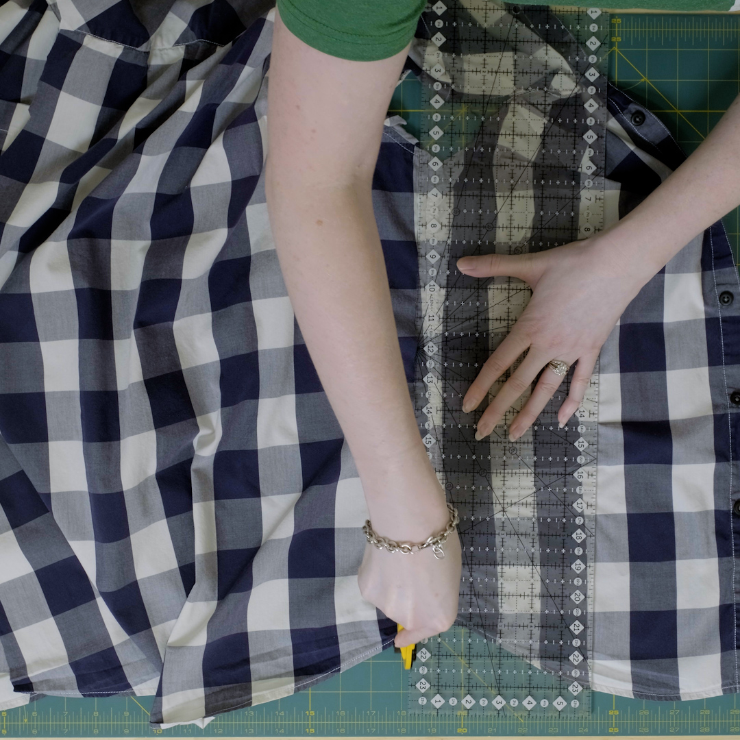 Rotary cutter and ruler used to cut side seams