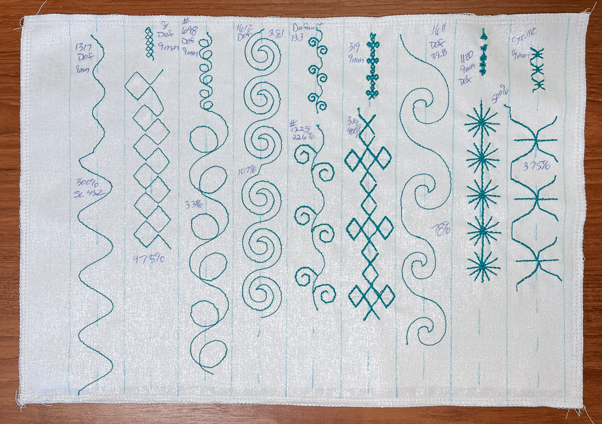 White fabric filled with stitch samples