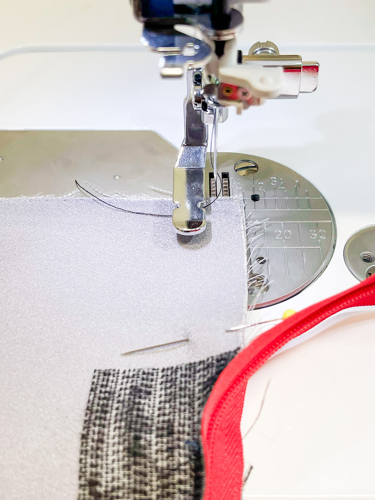 Move the Zipper Foot all the way to the left. 