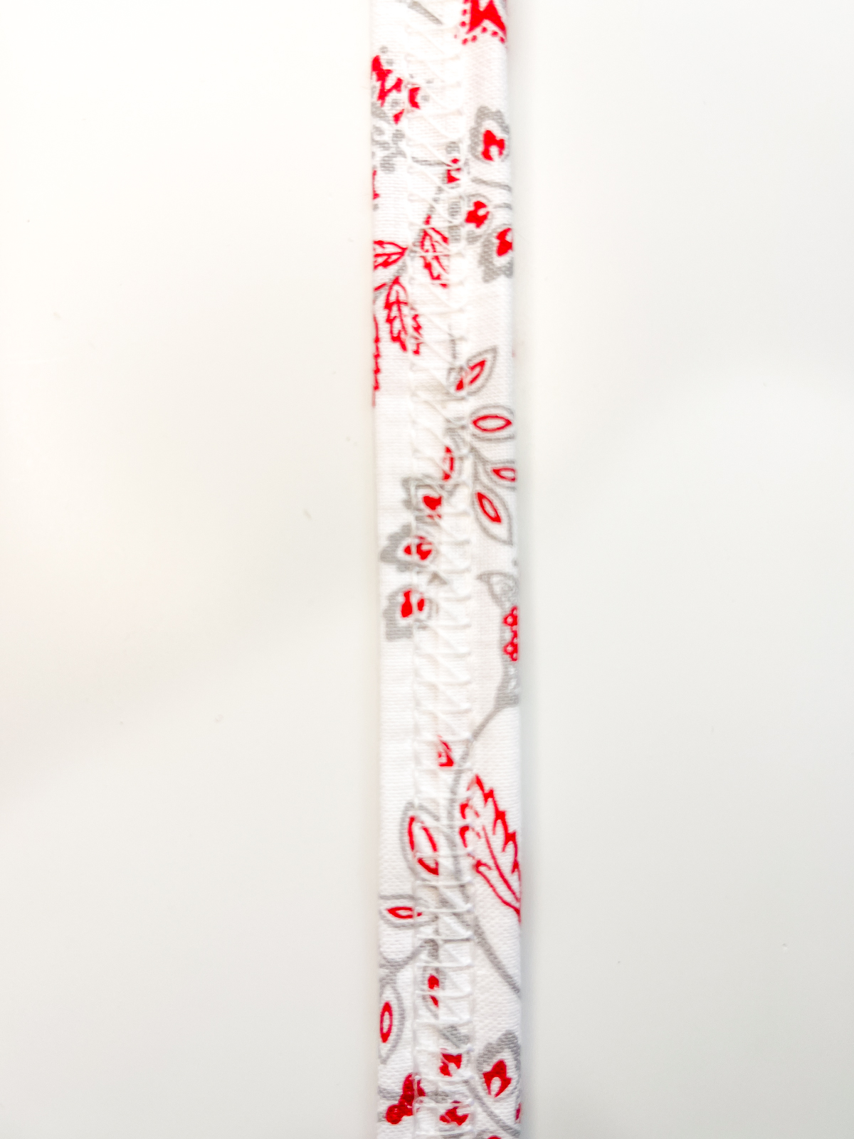 Close-up view of the finished strip sewn with the BERNINA Belt Loop Folder