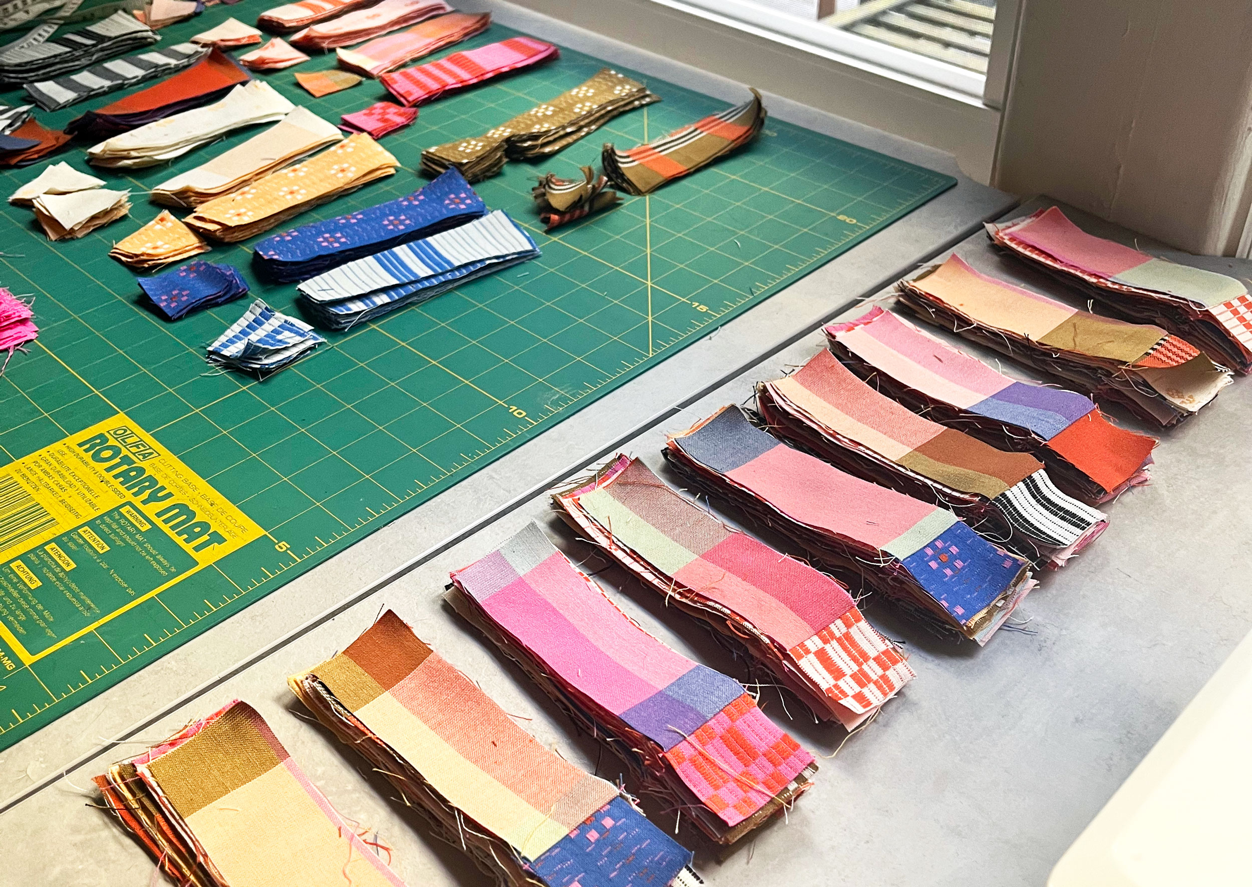 Stacks of chain piecing ready to be sewn.