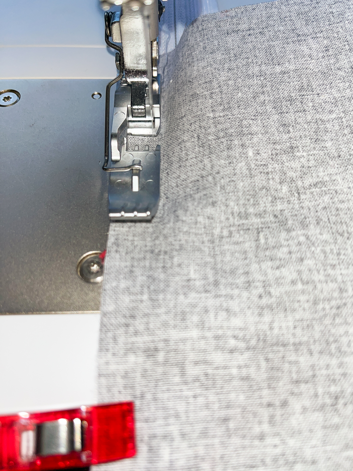 Close up view of sewing a zipper in place