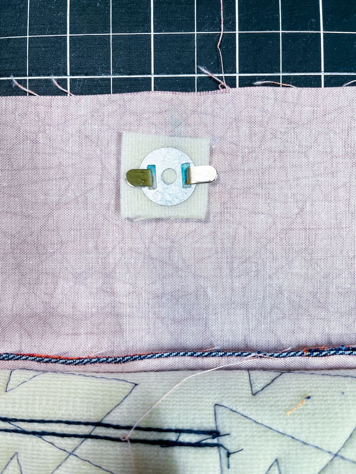 Placing a snap on the fabric