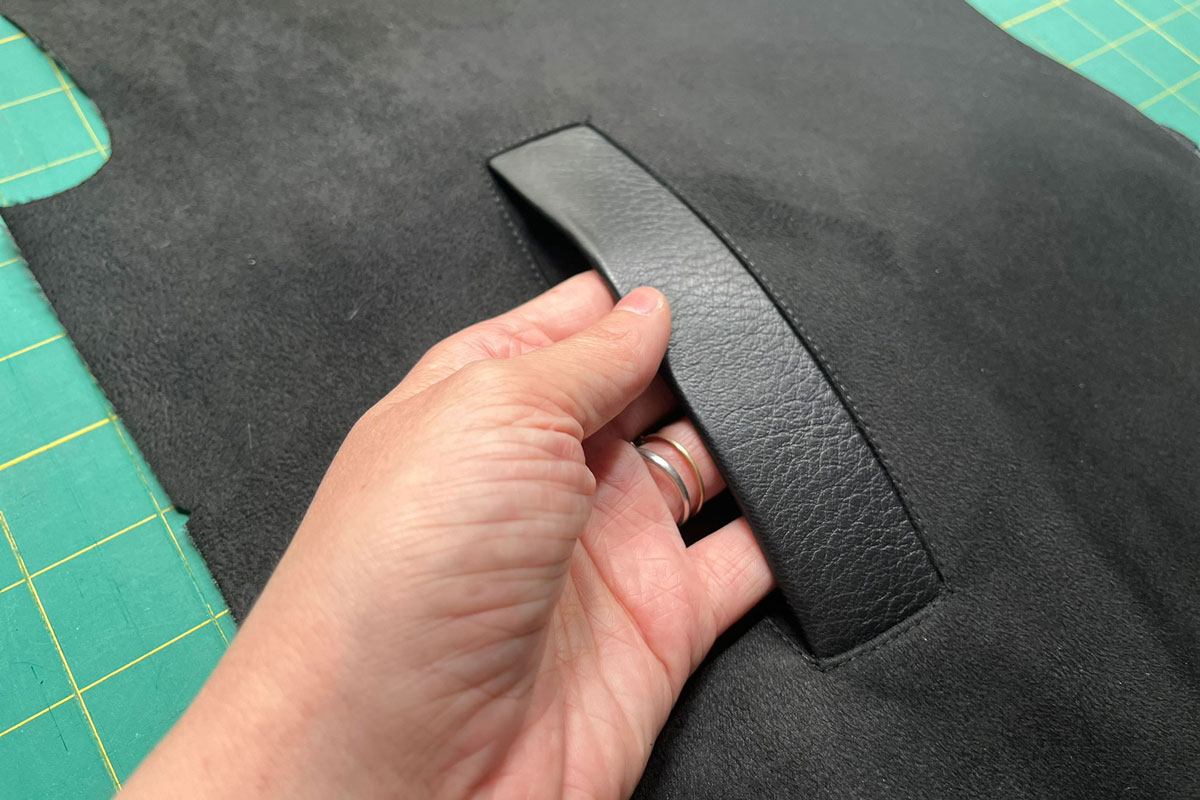 A close up of a finished single-welt pocket.