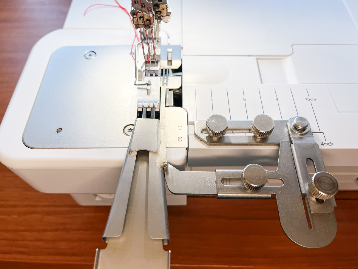 Belt loop folder attached to the serger