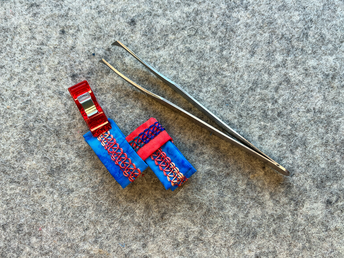 Now take a second blue piece and insert into the orange in the same way