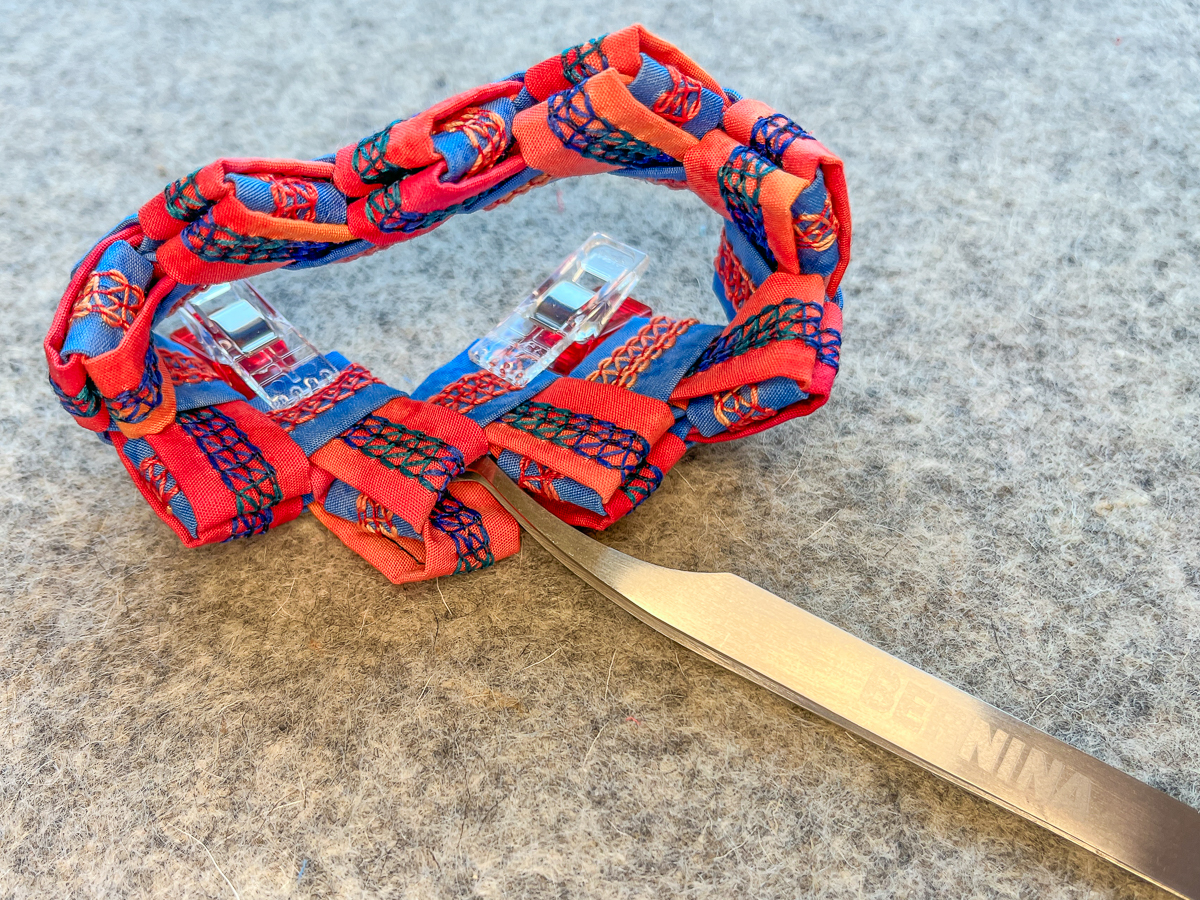 wrap around the outside of the other blue fold