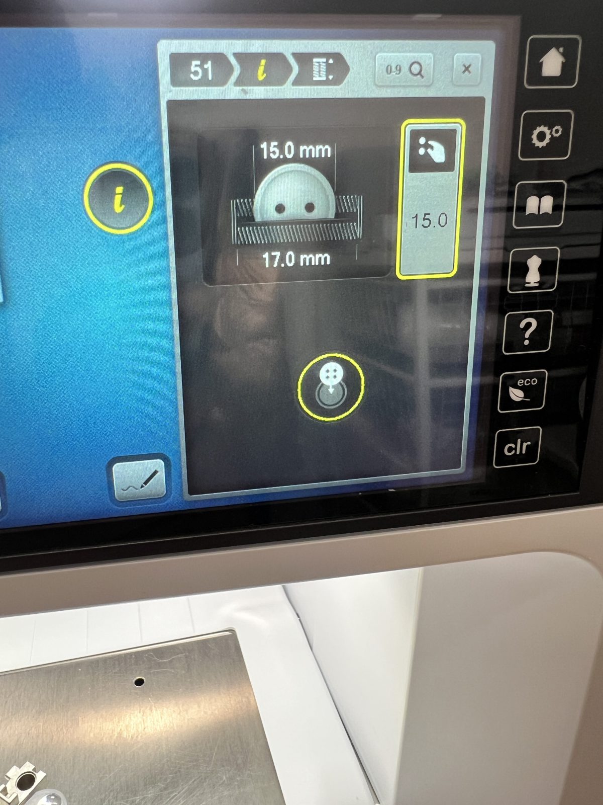 Close up of a BERNINA sewing machine touchscreen showing buttonhole length measurement with a button icon, set to 15.0 mm.
