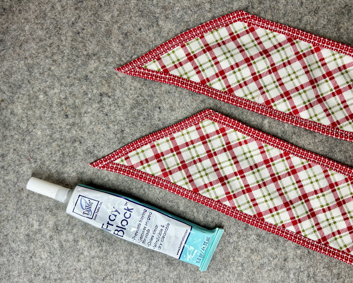 overhead view of the stitched ends cut and secured with fray check liquid.