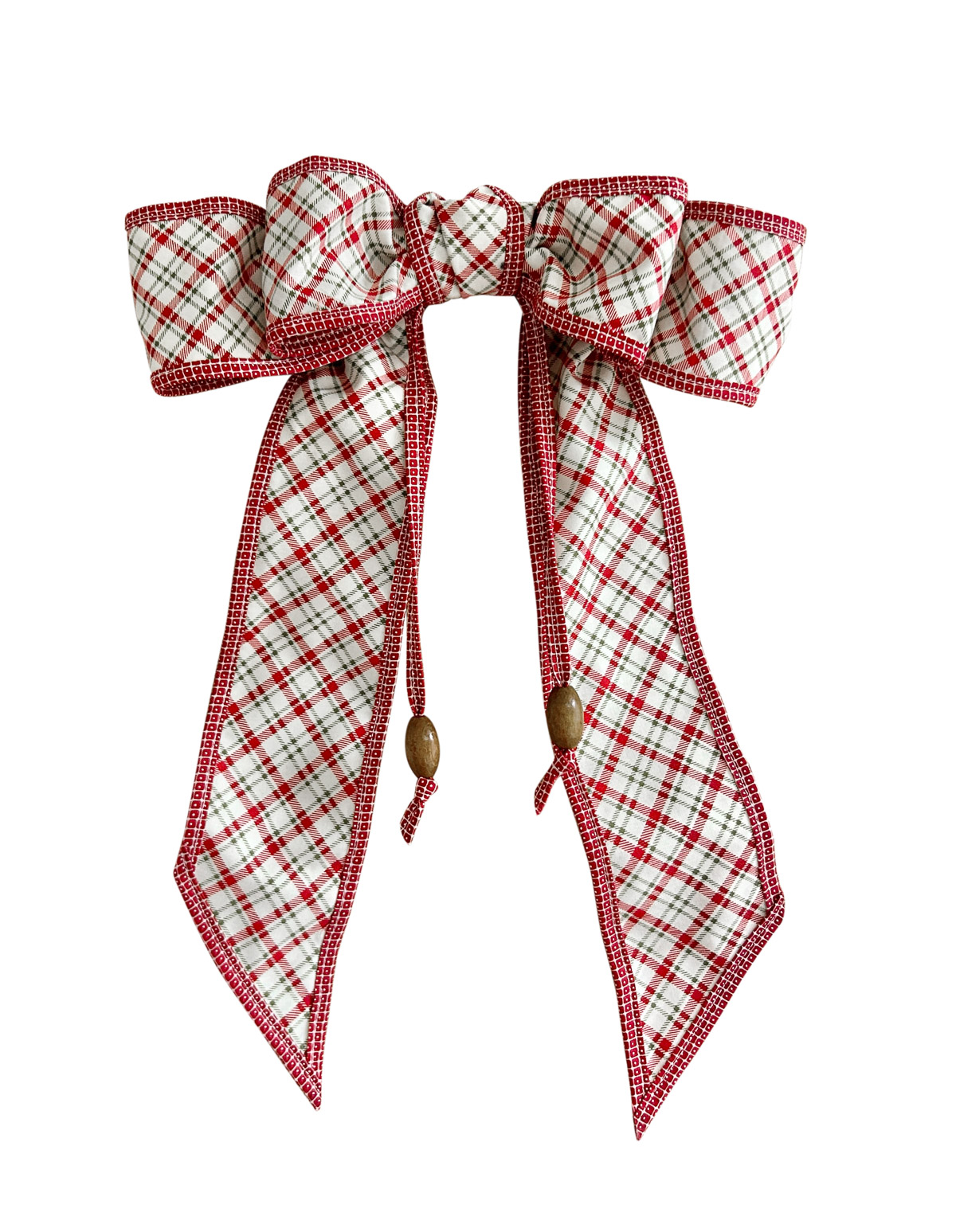 red plaid bow with wooden beads on a white background.