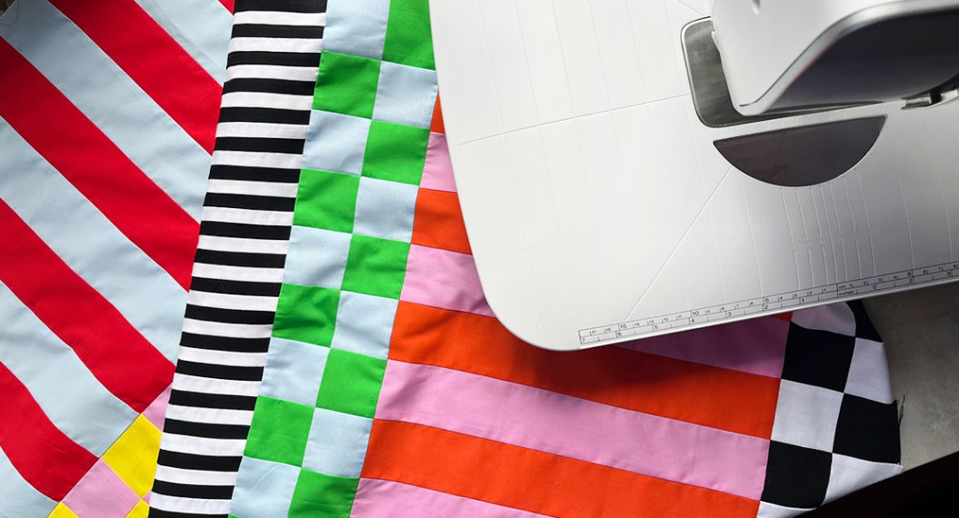 A top down look at the free quilt pattern Checks Mix by Jaclyn Salem.