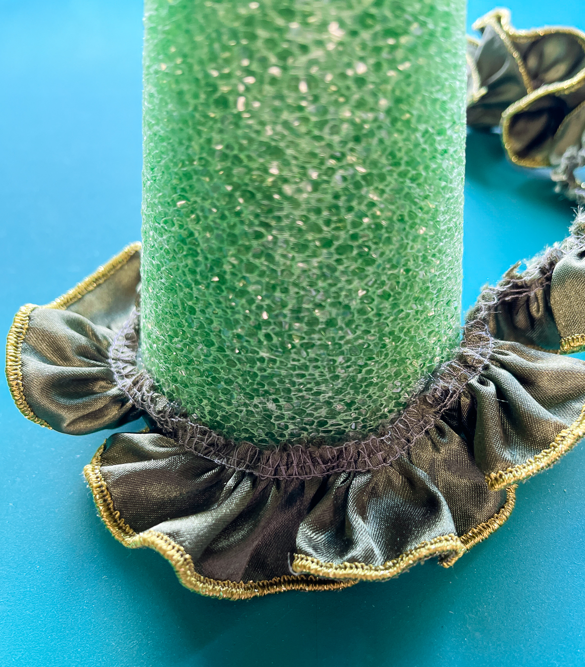 green cone with ruffled strip