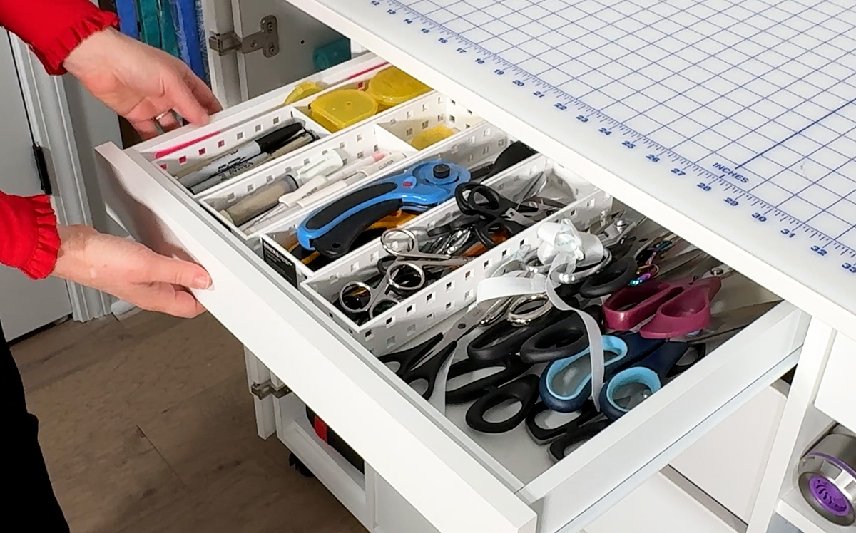 I keep all cutting and marking tools in the top wide drawer.