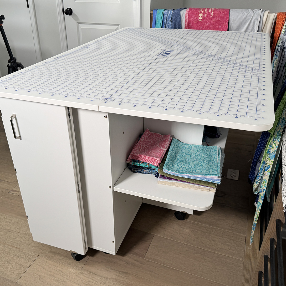 There are shelves for extra fabric in the back. I admit I cleaned this area before filming LOL.