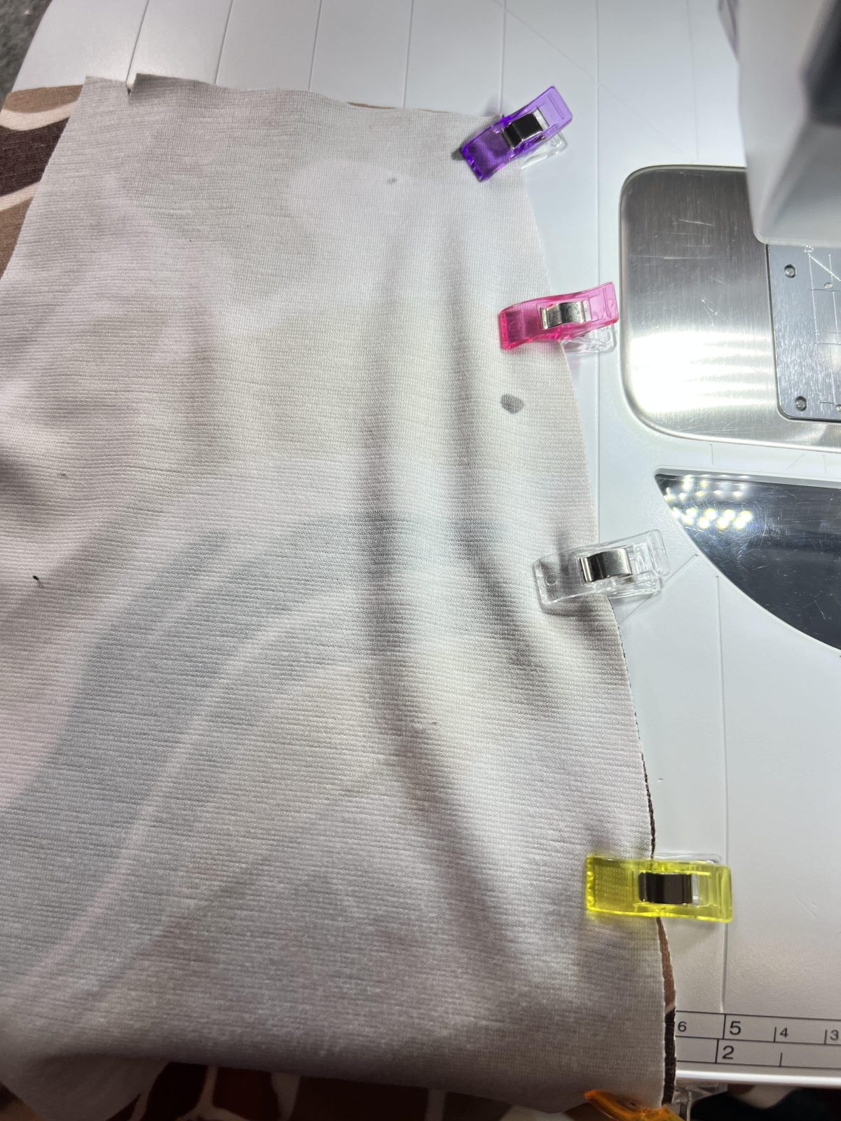 Clipped pocket fabric to back of pants