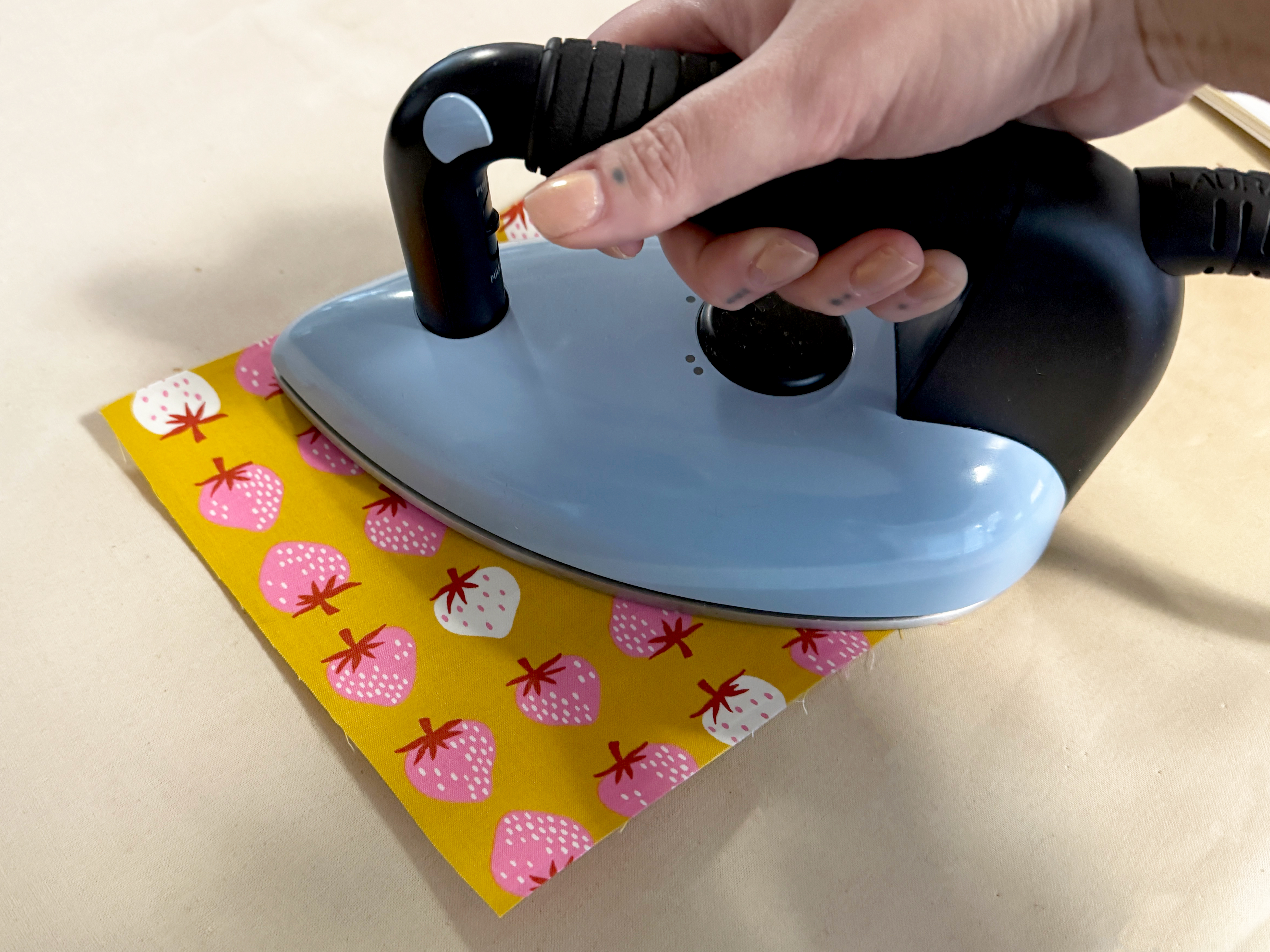 Fusing the web to applique fabric